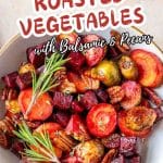 Image for Pinterest of honey roasted carrots, beets, and Brussels sprouts with pecans in a serving dish, topped with pecans and herbs. Hostess At Heart